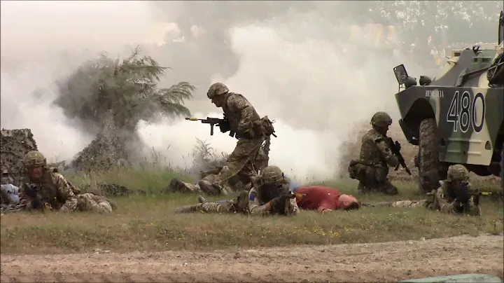 Warrior Infantry Section and Challenger 2 in mock battle